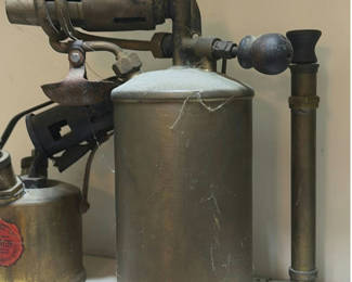 Lot 239: Antique blowtorches and torch accessories