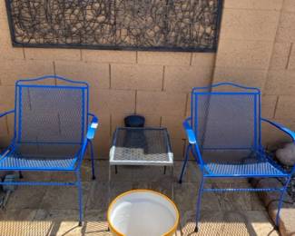 Two Chairs With Yard Decor