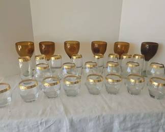 Set Of Gold Rimmed Glasses