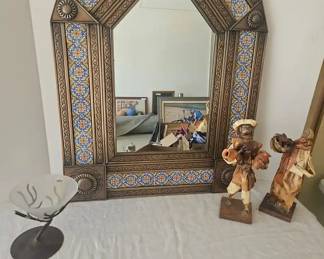 A Copper And Tile Mirror, Two Paper Mache Figures And A Zodax Piece