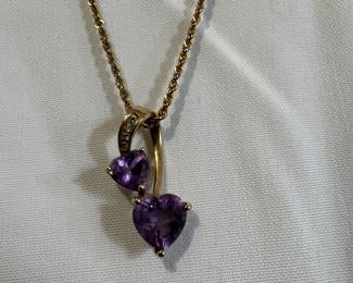 Amethyst and gold pendant and chain