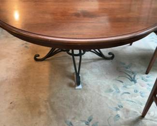 Round Mahogany Dining Table with Wrought Iron Pedestal Base