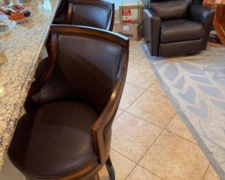 Three counter height  leather stools