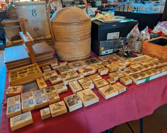 Extensive rubber stamp collection from local artist, Hand woven basket