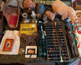 Antique games, abacus, graffiti from Henry Ford era soldiers on Prince Albert Tin, stone rhino