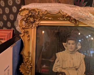 Antique portrait of lady in gold frame