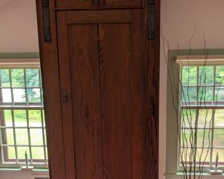 Beautiful oak wardrobe from England with inlaid metal art