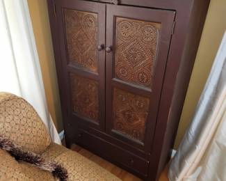 antique cabinet with tin door inserts
