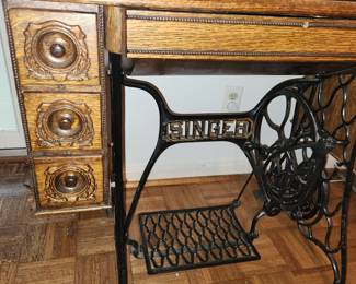 professionally restored Singer sewing machine table and machine