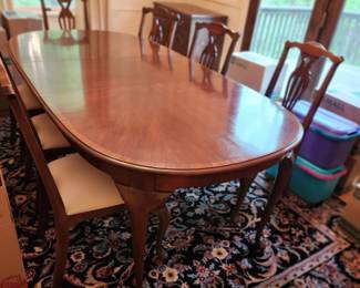 formal, banded Queen Anne dining table with 1 leaf and 8 chairs
