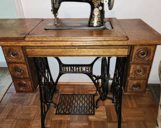 professionally restored Singer sewing machine table and machine