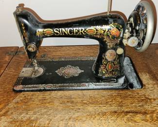 professionally restored Singer sewing machine table and machine