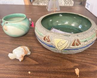 Two pieces of Roseville - pinecone and Mostique patterns.