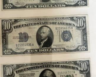 Vintage 1928, 1934 $10 bills, including a $10 silver certificate.