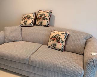 Striped Upholstered Sofa with Floral Toss Pillows