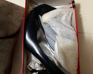 $225, Charles Jourdan black leather pointed toe pumps with silver lining and box.
