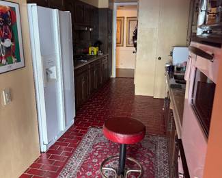 Red Vinyl Swivel Bar Stool with Chrome Base