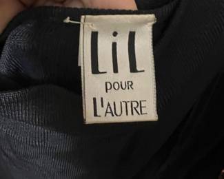 Black Ribbed Knit Top by Lil Pour L'Autre