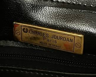 $300, Charles Jourdan Paris suede leather clutch handbag with panther face hardware and studded corners made in Spain