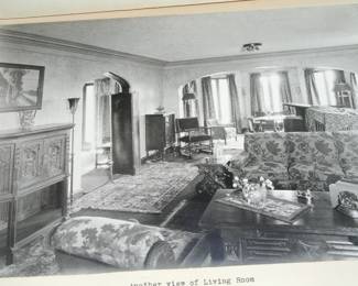 This photo from 1920 shows the hand-carved "buffet" piece, pictured on the far left.