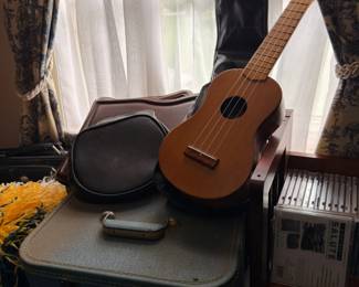 Vintage suitcases, ukulele and instrument case
