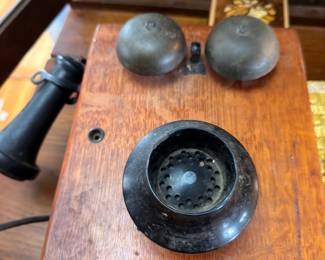 Antique oak wall telephone with brass bells
