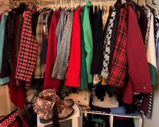 Women's coats, jackets and blazers on hangers