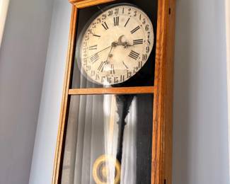 Carved oak wall regulator clock, Roman numeral dial and pendulum