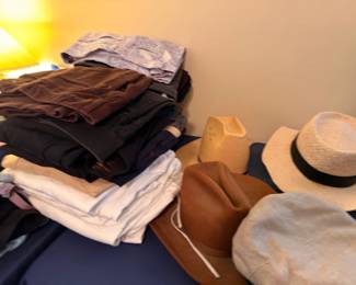 Men's clothing and hats including fedora and Panama hat