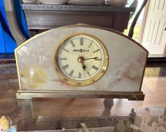 Howard Miller marble mantel clock with brass feet