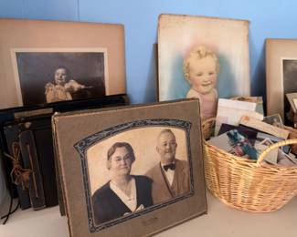 Antique framed portraits, vintage photographs and photo albums