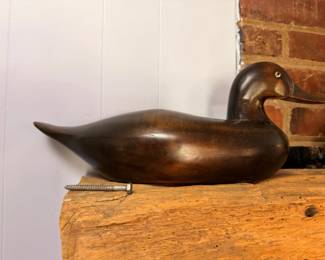 Antique carved wood duck decoy with keel weight