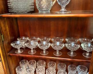 Etched crystal pitcher, goblets and champagne coupes