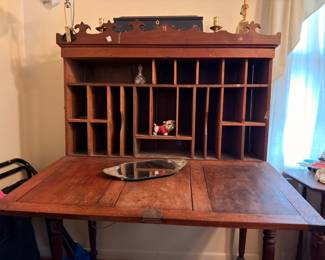 Antique walnut drop front secretary desk with cubbyholes