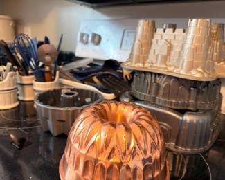 Vintage aluminum and copper Jell-O molds, Bundt pans and kitchen utensils