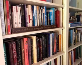 Bookshelves filled with hardcover books, history, religion and literature