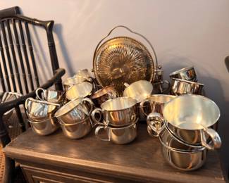 Collection of silverplate creamers, sugar bowls and serving pieces