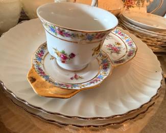 Floral teacup and saucer with gold trim