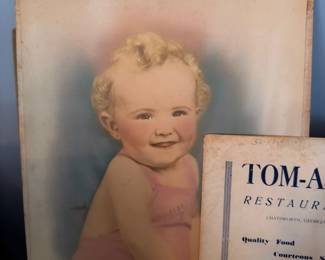Antique hand-tinted baby portrait and vintage restaurant menu