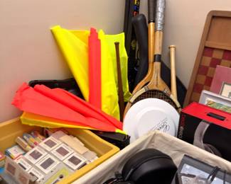 Sporting goods, tennis rackets, flags and assorted items