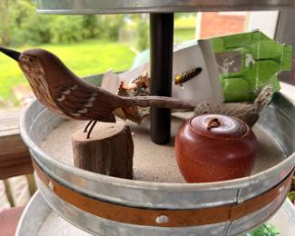 Carved wood bird figurine, redware apple and galvanized tub