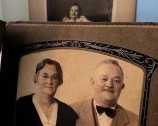Antique framed portrait photographs of a couple