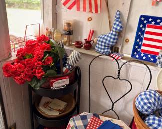 Patriotic Americana decor, American flags, pillows and red white and blue accents