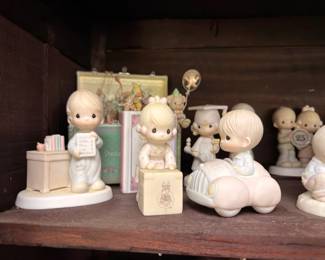 Precious Moments porcelain figurine collection with original boxes