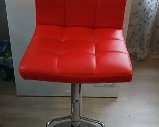 Leather like bar stools, adjustable and swivel. Four available.