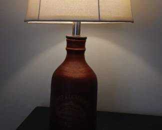 Pair of brick red colored Paris themed lamps.