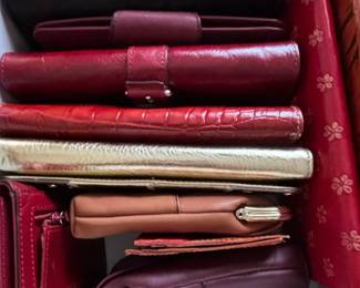 Assorted Womens Wallets and Clutches, Primarily Red and Burgundy Tones