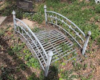 Ornate Metal Garden Bridge with Scrollwork and Finials
