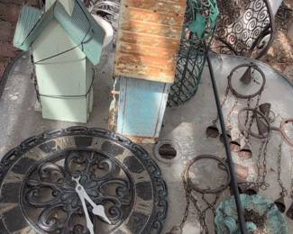 Ornate Cast Iron Wall Clock with Roman Numerals and Decorative Bells