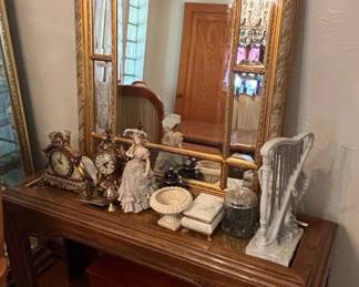 Ornate Gilt Mirror with Console Table and Decorative Accessories